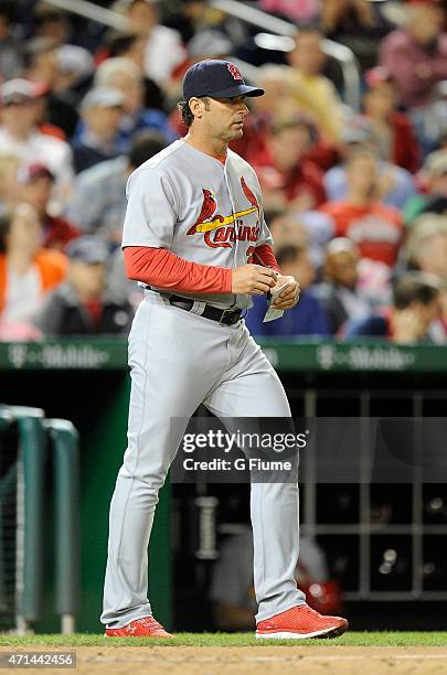 Manager Mike Matheny of the St. Louis Cardinals walks to the pitchers mound during the game against the Washington Nationals at Nationals Park on...