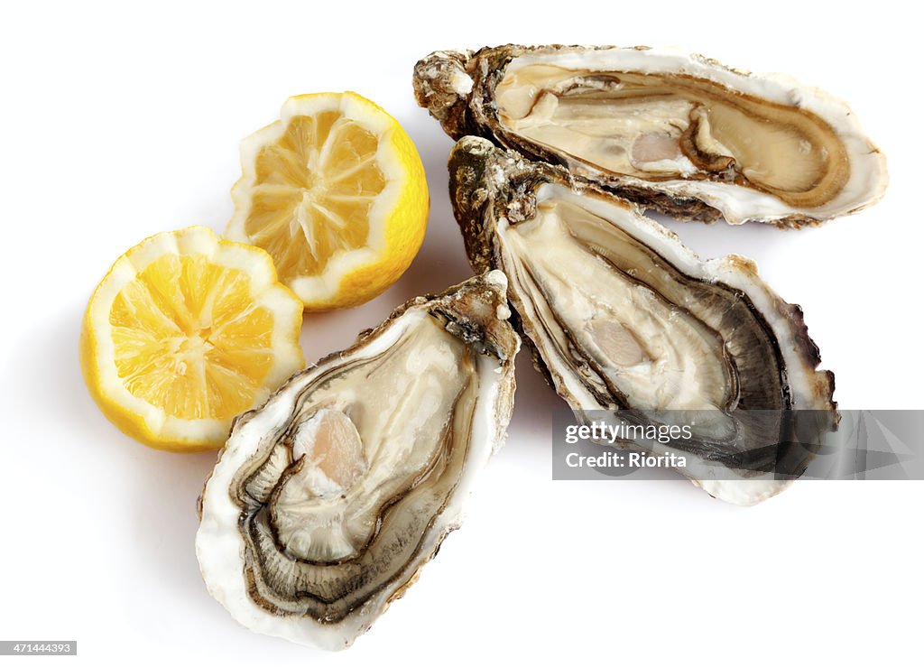 Three fresh oysters with lemon