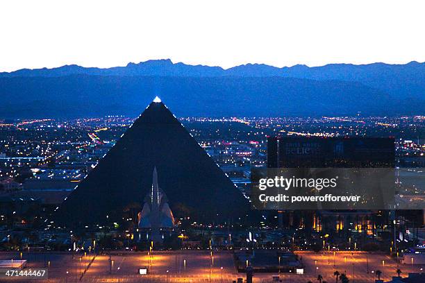 aerial shot of the luxor hotel and casino sunset - luxor hotel stock pictures, royalty-free photos & images