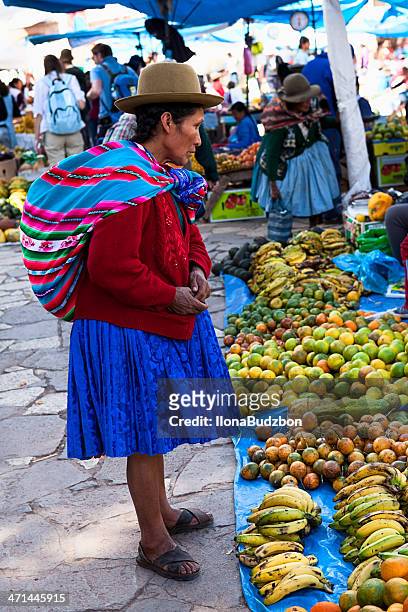 peruvian woman in national clothing - pisac stock pictures, royalty-free photos & images