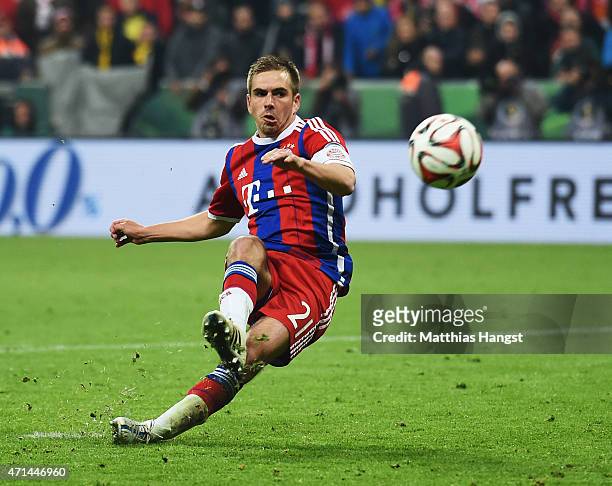Philipp Lahm of Muenchen slips over during the penalty shoot out during the DFB Cup semi final match between FC Bayern Muenchen and Borussia Dortmund...