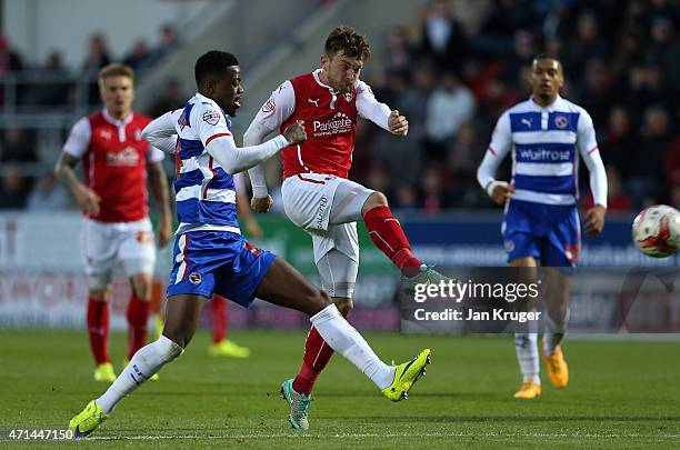 Lee Frecklington of Rotherham shoots at goal under pressure from Michael Hector of Reading during the Sky Bet Championship match between Rotherham...