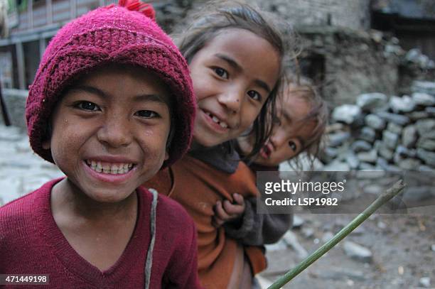 nepalese village childrens smiling - nepal people stock pictures, royalty-free photos & images