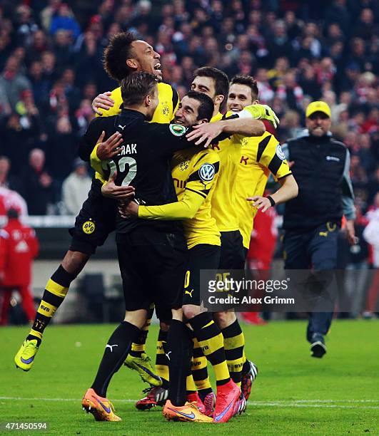 The players of Dortmund celebrate after winning during the penalty shoot out during the DFB Cup semi final match between FC Bayern Muenchen and...