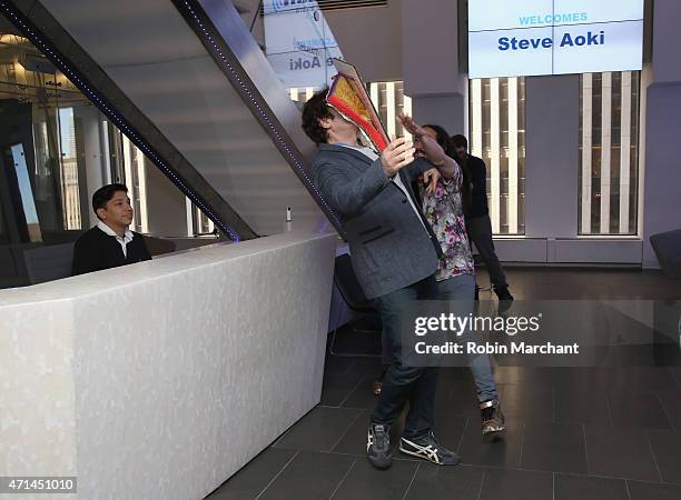 SiriusXM host Kid Kelly and Steve Aoki visit at SiriusXM Studios on April 28, 2015 in New York City.