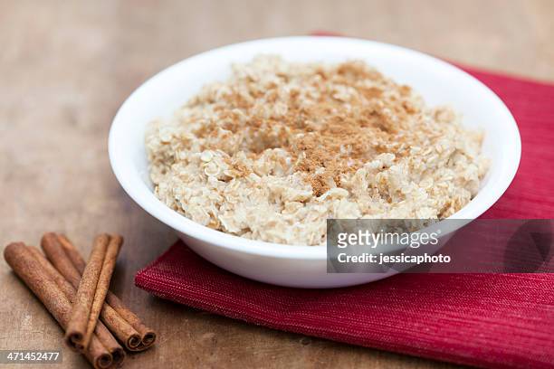 oatmeal with cinnamon and sugar - cinnamon stock pictures, royalty-free photos & images