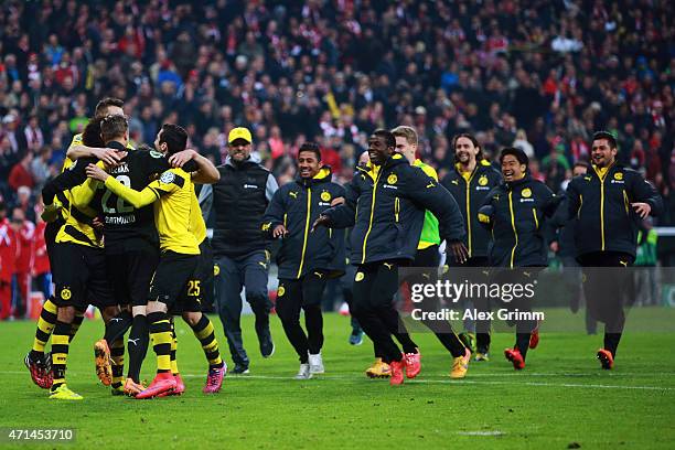 Goalkeeper Mitch Langerak of Dortmund and team mates celebrate after the DFB Cup Semi Final match between FC Bayern Muenchen and Borussia Dortmund at...