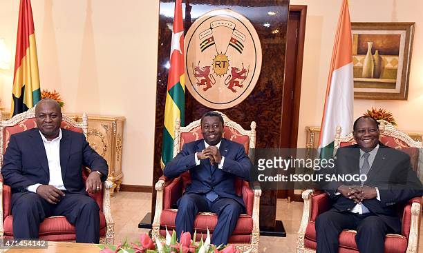 Togo's President Faure Gnassingbe attends a meeting with Ghanian President and ECOWAS chairmen John Dramani Mahama and Ivory Coast President Alassane...