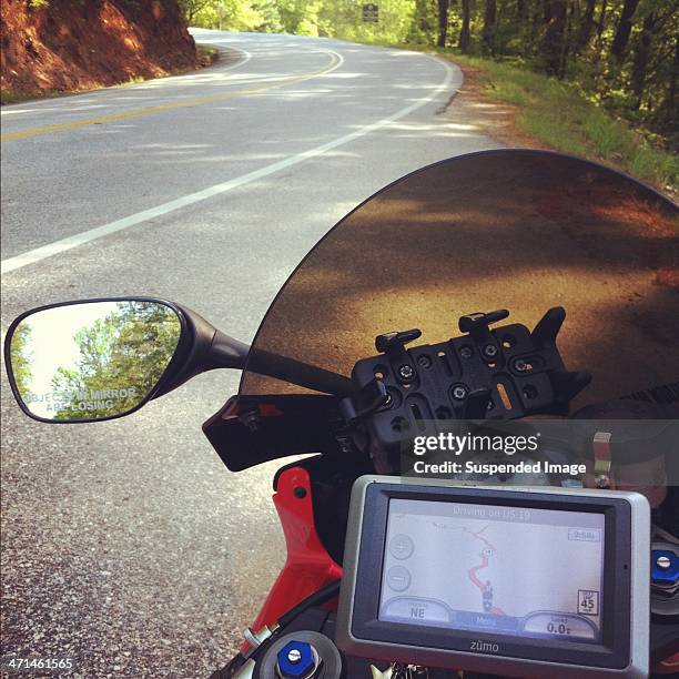 out for a motorcycle ride - garmin-global-positioning-system stock pictures, royalty-free photos & images
