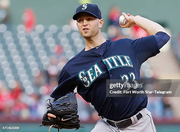 Seattle Mariners starting pitcher J.A. Happ throws during the first inning against the Texas Rangers at Globe Life Park in Arlington, Texas, on...