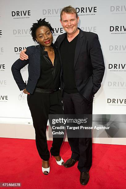 Devid Striesow and his wife Francine attend the DRIVE - Volkswagen Group Forum Berlin Opening on April 28, 2015 in Berlin, Germany.
