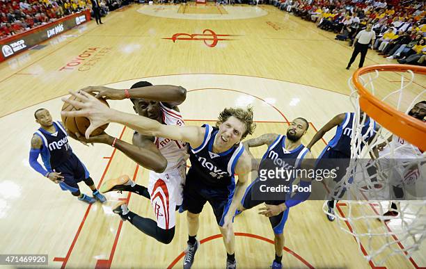 Dirk Nowitzki of the Dallas Mavericks defends against Clint Capela of the Houston Rockets during Game Five in the Western Conference Quarterfinals of...