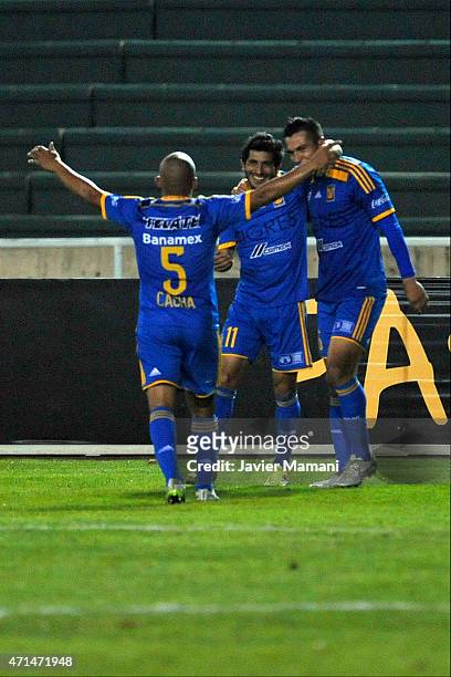 Damian Alvarez of Tigres celebrates with Enrique Esqueda and Egidio Arévalo Ríos after scoring his team's second goal during a first leg match...
