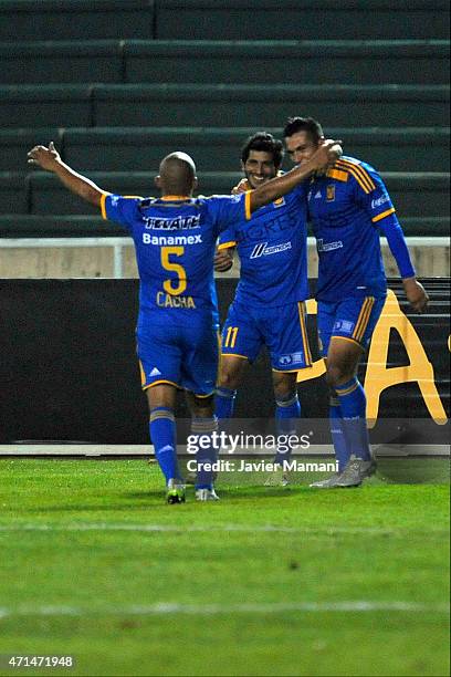 Damian Alvarez of Tigres celebrates with Enrique Esqueda and Egidio Arévalo Ríos after scoring his team's second goal during a first leg match...