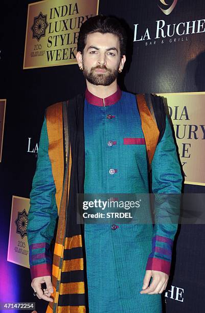 Indian Bollywood actor Nitin Neil Mukesh poses during a promotional event for India Luxury Style Week in Mumbai late April 28, 2015. AFP PHOTO/STR