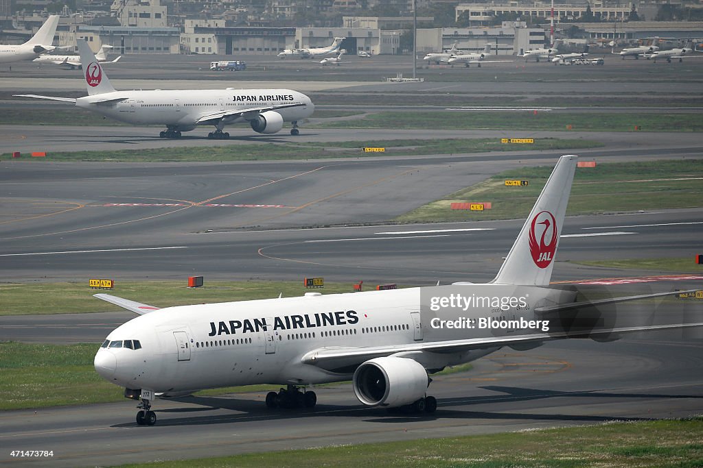 Japan Airlines Co. (JAL) And All Nippon Airways Co. (ANA) Aircraft At Haneda Airport Ahead Of Full-Year Earnings