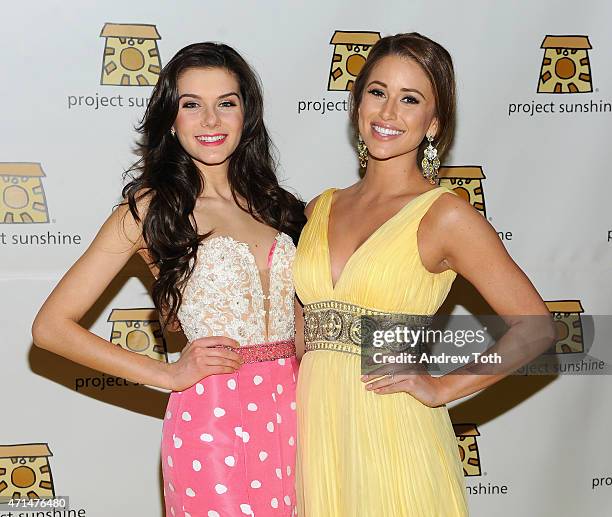 Miss Teen USA K. Lee Graham and Miss USA Nia Sanchez attend Project Sunshine's 12th Annual Benefit Celebration on April 28, 2015 in New York City.