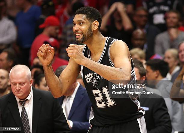 Tim Duncan of the San Antonio Spurs celebrates in the final seconds after the Spurs sealed the victory against the Los Angeles Clippers during Game...