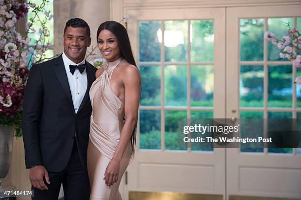 Russell Wilson, Seattle Seahawks and Ciara Harris arrive at the White House for a state dinner with the Japan's Prime Minister Shinzo Abe and his...