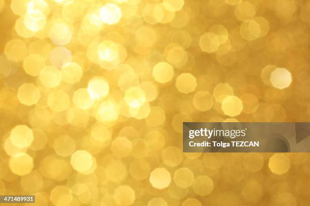 golden unfocused light background - christmas party stockfoto's en -beelden