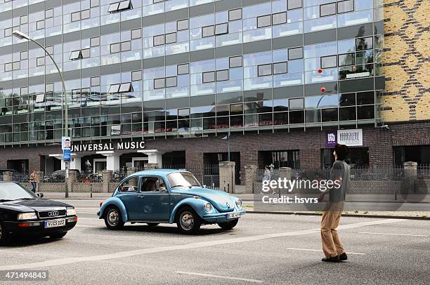 juggler performs with balls in front of a crossroads - train intersection stock pictures, royalty-free photos & images