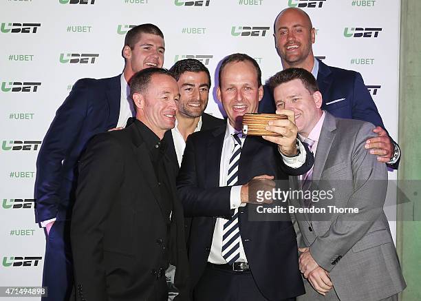 Jonathan Brown, Greg Murphy, Anthony Minichiello, Tatts Group CEO, Robbie Cooke, Jason Bennett and Nathan Sharpe pose for a 'Selfie' during the UBET...