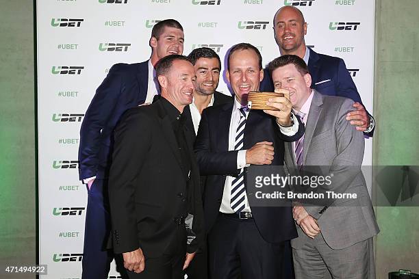 Jonathan Brown, Greg Murphy, Anthony Minichiello, Tatts Group CEO, Robbie Cooke, Jason Bennett and Nathan Sharpe pose for a 'Selfie' during the UBET...