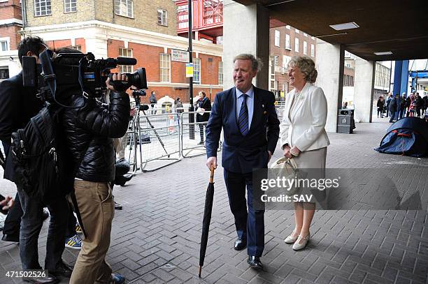 Lookalikes of Prince Charles, Prince of Wales and Camilla, Duchess of Cornwall visit the gathered media and Royal fanatics who are waiting at St...