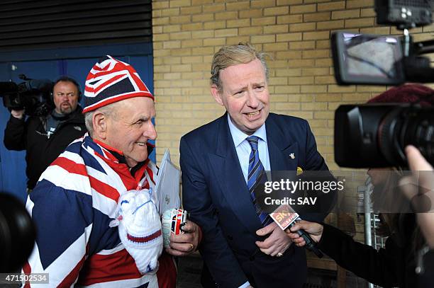 Lookalikes of Prince Charles, Prince of Wales and Camilla, Duchess of Cornwall visit the gathered media and Royal fanatics who are waiting at St...