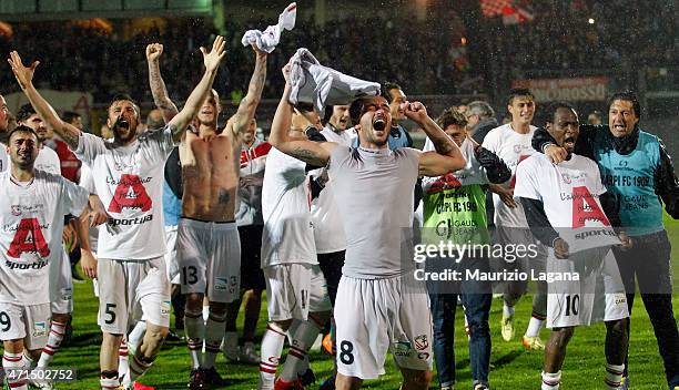 Players of Carpi celebrate after being promoted to Serie A during the Serie B match between Carpi FC and FC Bari at Stadio Sandro Cabassi on April...