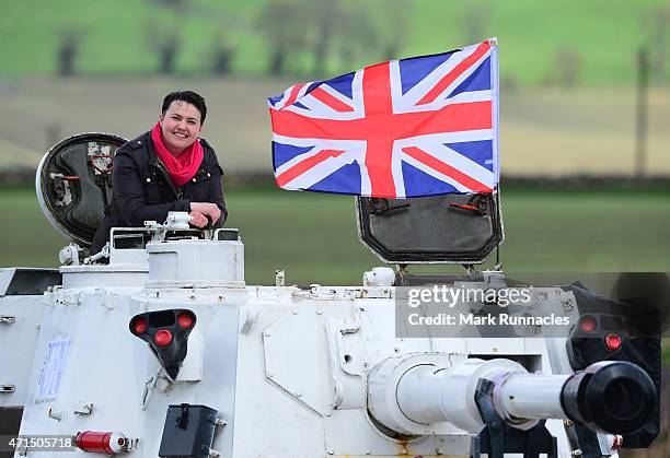 The Scottish Conservative Leader Ruth Davidson gets behind the controls of a Tank at Auchterhouse Country Sports, as she highlights how the country's...