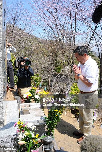 Japan Airlines Chairman Masaru Onishi prays for the victims of the JAL123, crashed at Mount Osutaka and killed 520 passengers and crews in 1985, at...