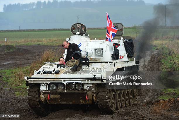 The Scottish Conservative Leader Ruth Davidson gets behind the wheel of a Tank at Auchterhouse Country Sports, as she highlights how the country's...