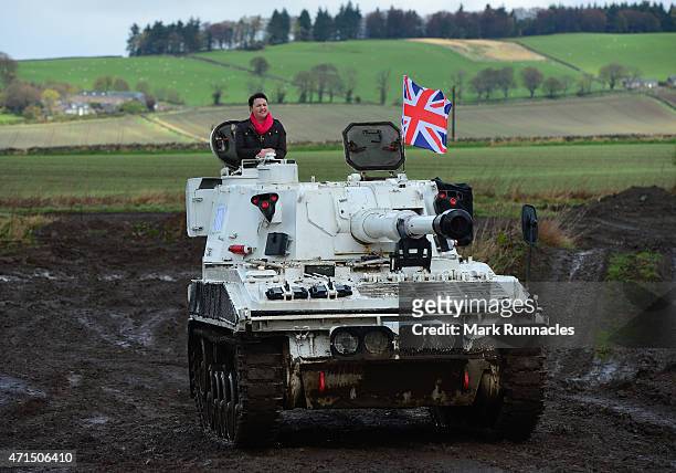 The Scottish Conservative Leader Ruth Davidson gets behind the wheel of a Tank at Auchterhouse Country Sports, as she highlights how the country's...