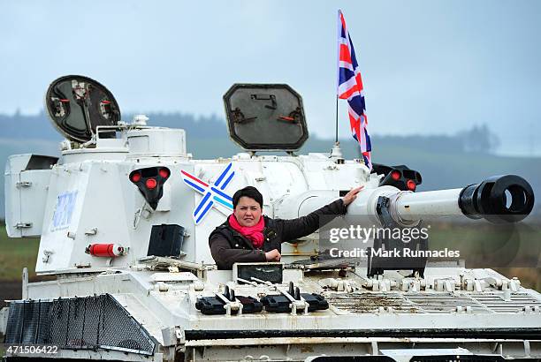 The Scottish Conservative Leader Ruth Davidson gets behind the wheel of a Tank at Auchterhouse Country Sports, as she highlights how the country's...