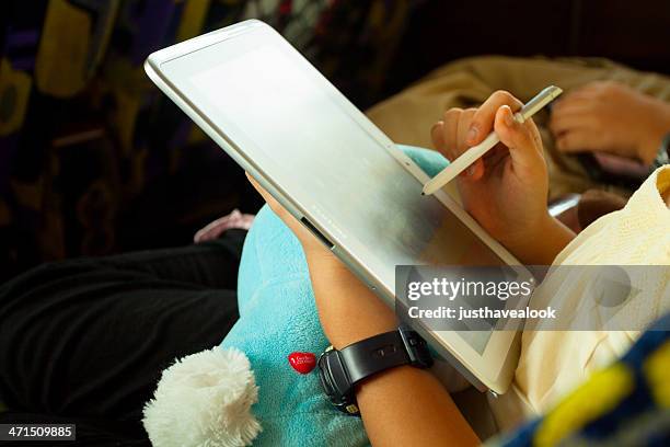 tablet time - samsung stock pictures, royalty-free photos & images