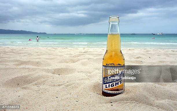 san mig light on the beach - boracay beach stock pictures, royalty-free photos & images