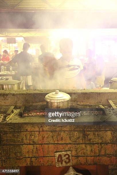 larsians - smoking grill - fumes cooking stock pictures, royalty-free photos & images