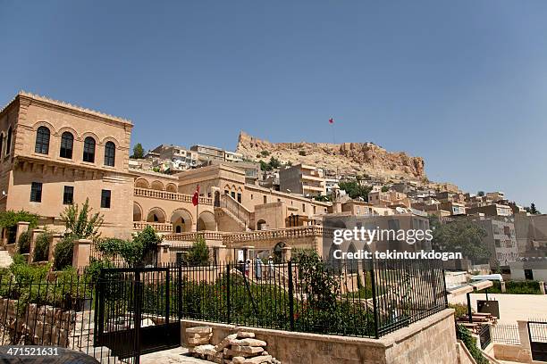 family visiting mardin museum in turkey - mardin stock pictures, royalty-free photos & images