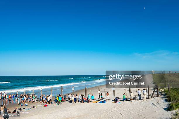 watching a rocket launch at cape canaveral - cape canaveral stock pictures, royalty-free photos & images