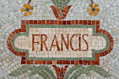 Pope Francis name in red mosaic patchwork
