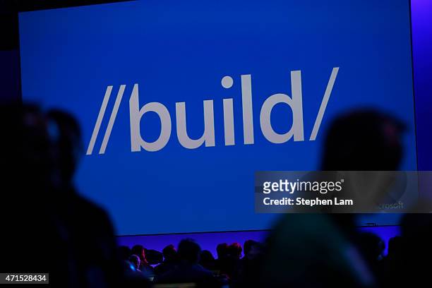 April 29: Attendees walk past a Microsoft Build sign during the 2015 Microsoft Build Conference on April 29, 2015 at Moscone Center in San Francisco,...
