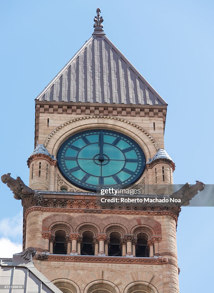 Clock tower in Old City Hall in Toronto seen from different...