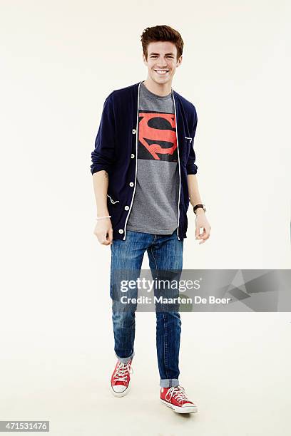 Actor Grant Gustin from CW's 'The Flash' pose for a portrait at the TV Guide portrait studio at San Diego Comic Con for TV Guide Magazine on July 24,...