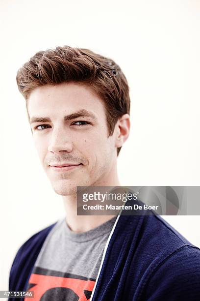 Actor Grant Gustin from CW's 'The Flash' pose for a portrait at the TV Guide portrait studio at San Diego Comic Con for TV Guide Magazine on July 24,...