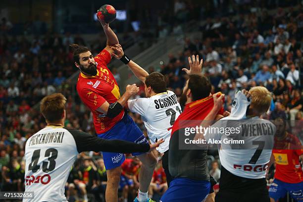 Jorge Maqueda Pena of Spain is challenged by Erik Schmidt of Germany during the European Handball Championship 2016 Qualifier match between Germany...