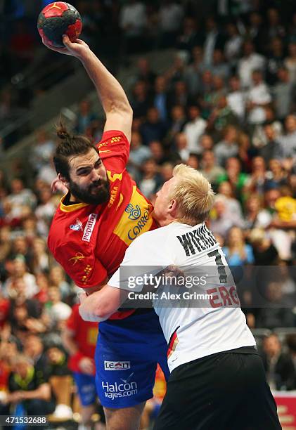 Jorge Maqueda Pena of Spain is challenged by Patrick Wiencek of Germany during the European Handball Championship 2016 Qualifier match between...