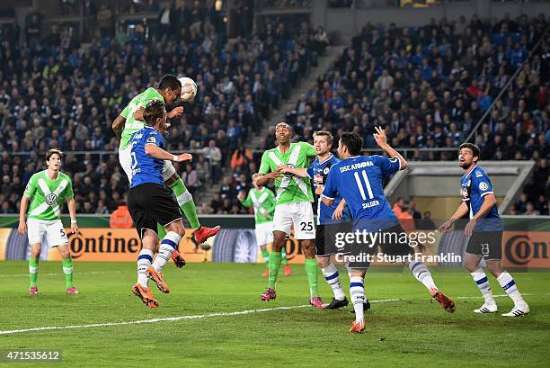 Luiz Gustavo of Wolfsburg scores his team's second goal during the DFB Cup Semi Final match between Arminia Bielefeld and VfL Wolfsburg at Schueco...