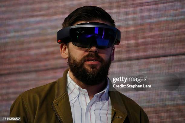 The Microsoft HoloLens augmented reality headset is demonstrated on stage during the 2015 Microsoft Build Conference on April 29, 2015 at Moscone...