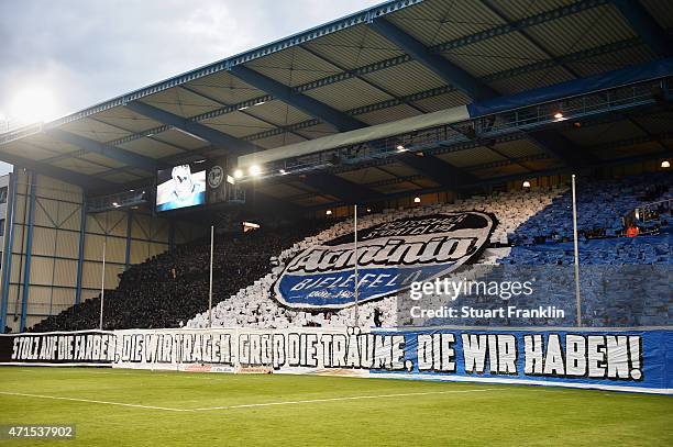 Fans of Bielefeld perform a fan choreography prior to the DFB Cup Semi Final match between Arminia Bielefeld and VfL Wolfsburg at Schueco Arena on...